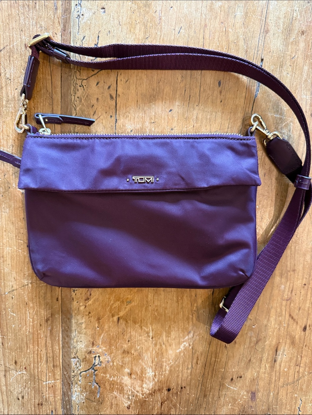 Tumi Voyager Collection Plum Nylon Crossbody with Gold Hardware & adjustable str